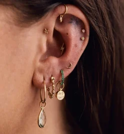 Mesmerising Star Piercing Front 14K